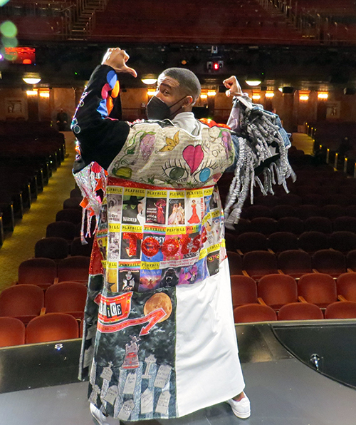 Justin Prescott shows off the Robe that features 'Head Over Heels,' a show for which he also received the Robe.